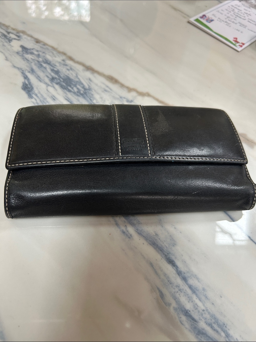 Coach Black Leather Fold-Over Clutch Wallet with Contrast Stitching